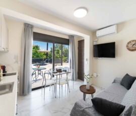 A comfortable and stylish living area designed for relaxing moments during your Lefkada holiday. Bright living room with sofa bed at Aurelia Apartment in Nikiana Lefkada