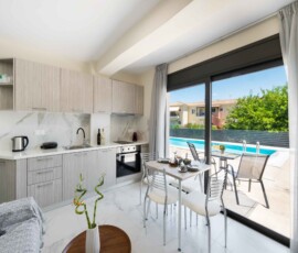 A comfortable and stylish living area designed for relaxing moments during your Lefkada holiday. Bright living room with sofa bed at Aurelia Apartment in Nikiana Lefkada